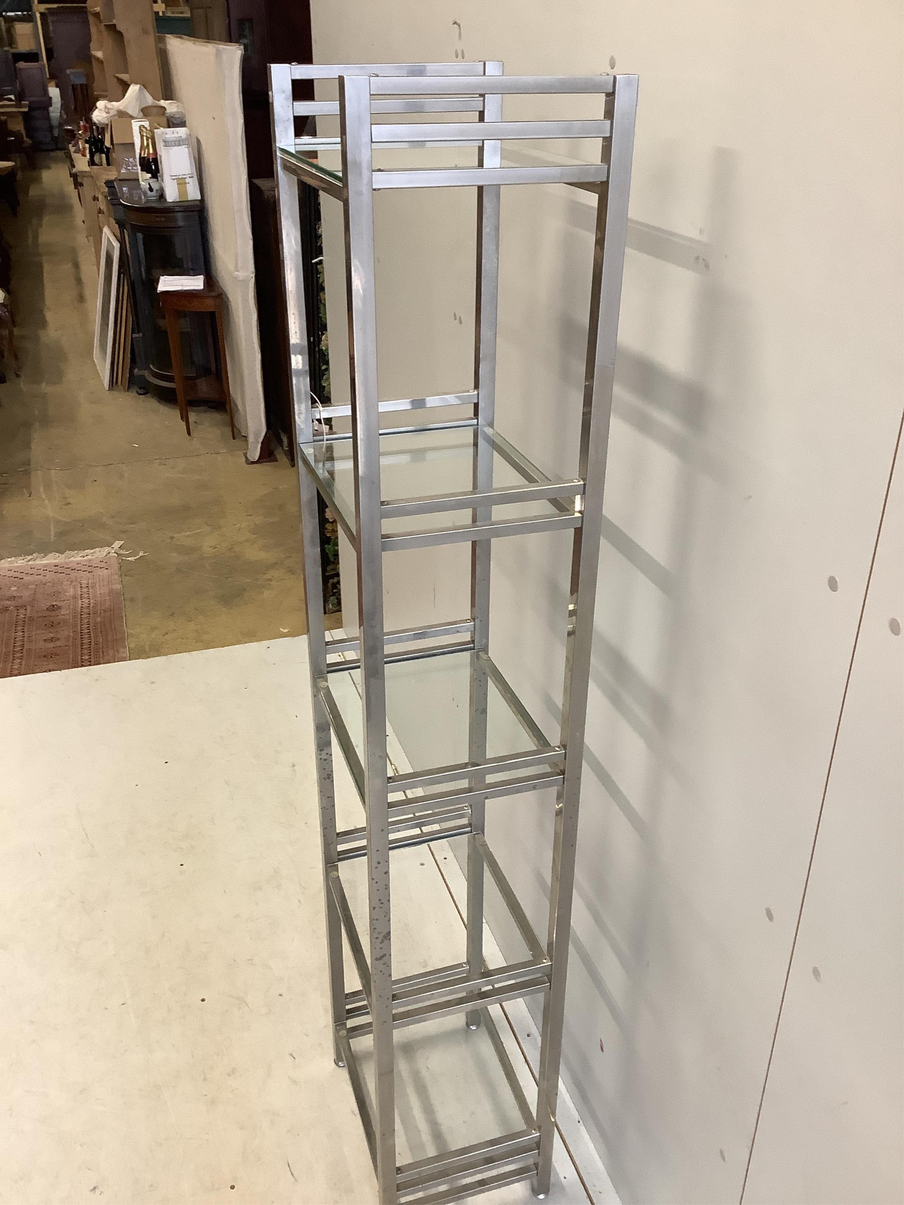 A chrome and glass five tier display unit, width 40cm, depth 30cm, height 176cm. Condition - fair